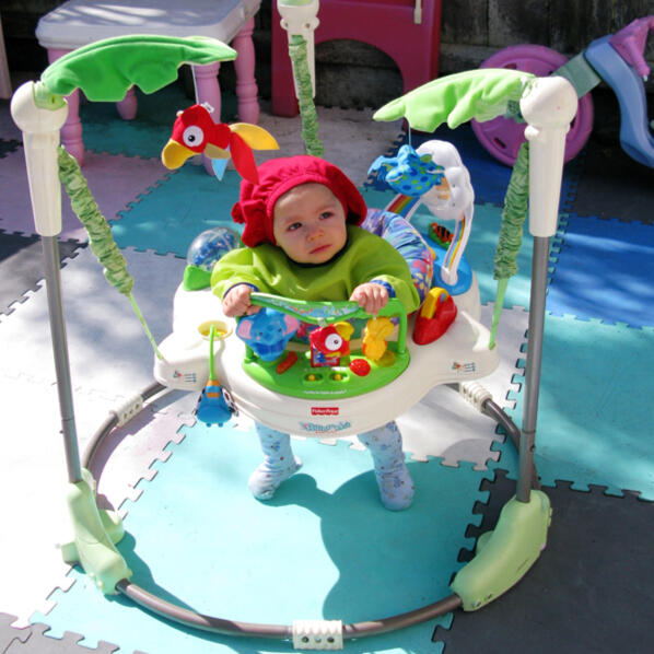 Untitled Infant enjoying outdoor playtime