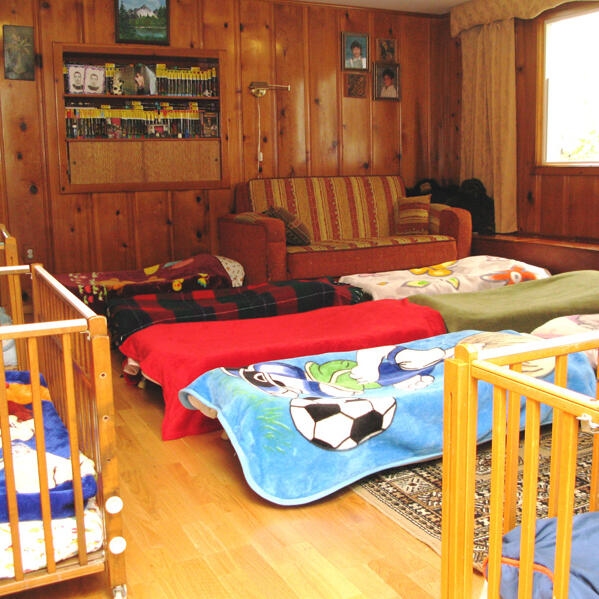 Untitled Rest area with children’s beds and blankets