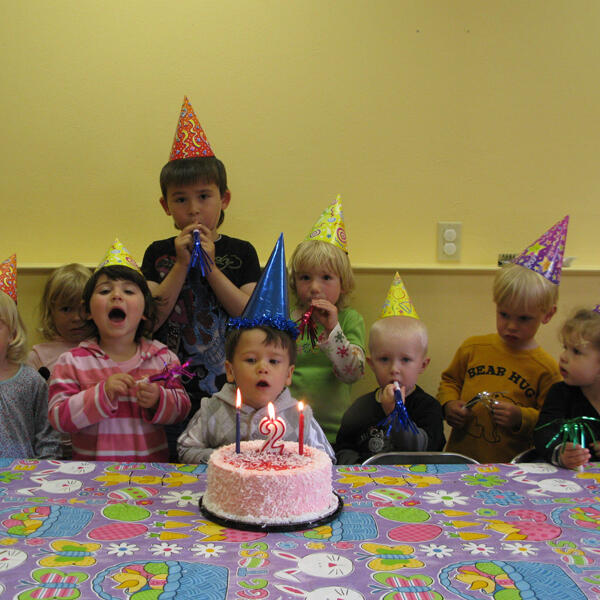 Untitled Toddlers celebrating a birthday together