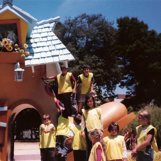Untitled Children on a group field trip outdoors