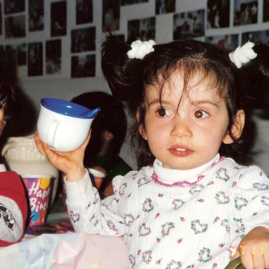 Untitled Child enjoying a meal at preschool