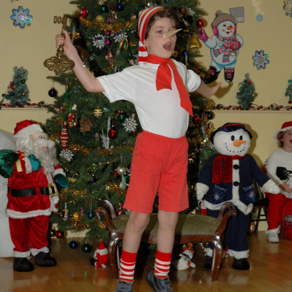 Untitled Child performing in a holiday costume