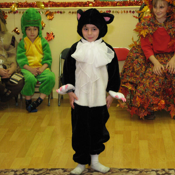 Untitled Child performing in a cat costume